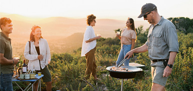Group of people having a braai Group of people having a braai
